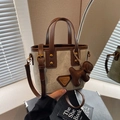 Beige canvas mini bucket bag with brown leather trim and cute puppy charm accessory - White Brown With Charm