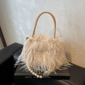Beige faux fur bucket bag with pearl chain and brown leather top handle for autumn style - Beige