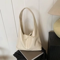 Minimalist cream white tote bag with glossy finish and knotted rope detail - White