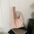 Light pink patent leather tote bag featuring a decorative bow tie and glossy finish - Sakura Pink