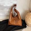 Brown patent leather tote bag with drawstring detail and vintage hobo silhouette - Brown