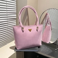 Elegant pink suede tote bag with minimalist golden triangle logo and slim shoulder straps - Pink
