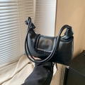 Borsa a tracolla in pelle nera opaca con bordo a pieghe e tracolla con nodi - Nero