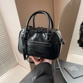 Glossy black crinkled leather handbag with double top handles and adjustable shoulder strap - Black