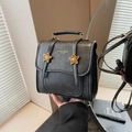 Versatile black leather backpack with star buckles and fashion lettering for women - Black