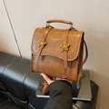 Retro caramel brown leather backpack for women with gold star details and handle - Brown