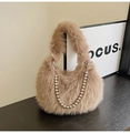 Detail of camel faux fur plush bag with stylish silver beaded chain for winter fashion - Khaki