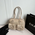 Beige faux leather shoulder bag with decorative bows and front pockets in vintage style - Off White