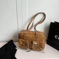 Brown faux leather shoulder bag featuring vintage bow pockets and silver hardware - Khaki