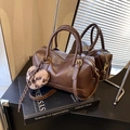 Dark brown leather Boston bag with leopard print pompom charm and golden hardware - Coffee with Pendant