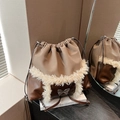 Khaki fabric and brown leather bucket bag with plush trim and butterfly charm - Khaki