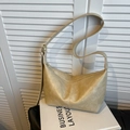 Retro cream beige hobo bag with vintage leather texture and adjustable shoulder strap - White