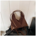 Donkerbruine vintage hobo tas van mat suède en leer met trekkoord details - Bruin