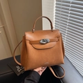 Borsa a mano color caramello in pelle e camoscio con elegante chiusura rotante - Marrone