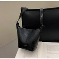 Close-up of vintage black bucket bag in crinkled leather with silver logo detail - No Pendant / Black
