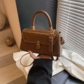 Retro brown square handbag in faux leather finish with metallic lock and top handle - Brown