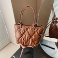 Deep brown quilted bucket bag with padded diamond texture and thin top handles - Brown