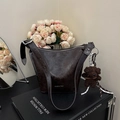 Retro dark brown bucket bag with plush bear charm and metallic silver hardware - With Charm / Ebony