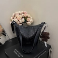 Black vintage textured bucket bag with metal ring strap and brown bear charm - With Charm / Black