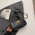 Classic black Boston bag with golden triangle logo, dual handles and crossbody strap - Style Without Charm / Black