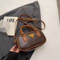 Vintage brown Boston bag with metallic triangle logo and adjustable crossbody strap - Style Without Charm / Brown and Khaki