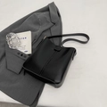 Classic black leather vintage bucket bag with elegant vertical stitching and long shoulder strap - Black