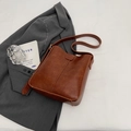 Vintage caramel brown bucket bag in textured synthetic leather with top handle - Brown