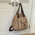 Grande zaino in nylon kaki con cinghie marroni e design funzionale a tasche multiple - Cachi