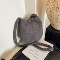 Deep grey faux fur bucket bag with plush wool-like texture and matching shoulder strap - Gray