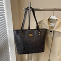 Vintage textured black tote bag with gold rivets and spacious leather interior - Black