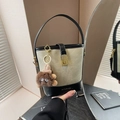 Beige canvas and black leather vintage bucket bag with a cute plush monster charm - With Charm / Beige & Black