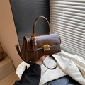 Deep brown textured faux leather handbag with gold hardware and removable crossbody strap - Brown