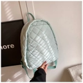 Pale mint green quilted puffer backpack with large grid pattern and woven straps - Green