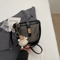 Retro grey bucket bag with black leather trim, gold twist lock and fun plush charm - Blackish Green With Pendant