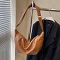 Brown faux leather crescent dumpling bag with adjustable strap and silver hardware - Brown