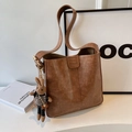 Brown vintage faux leather tote bag with a cute rabbit charm and fashion embossing - Beige Khaki With Charm
