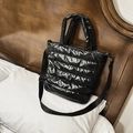 Quilted black puffer tote bag with glossy finish and detachable shoulder strap for daily use - Black Without Small Bag