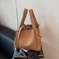 Brown litchi pattern leather bucket bag with top handles and adjustable strap - Brown