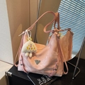 Pale pink cloud pattern tote bag with silver triangle logo and plush cloud charm - Pink with Pendant