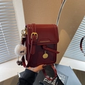 Chic red mini crossbody phone bag in glossy PU leather with cute fur ball charm decoration - Wine Red With Pendant