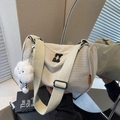 Beige corduroy crossbody pillow bag with wide strap and plush cloud charm accessory - With Charm / Off White