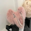 Pink heart-shaped fluffy faux fur shoulder bag with silver metallic pearl chain strap - Pink