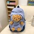 Blue patchwork backpack featuring an embedded plush teddy bear doll and KEKEMI logo - Blue