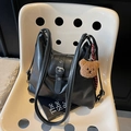 Retro black tote bag with white contrast stitching, buckles, and a cute teddy bear charm - Black with Pendant