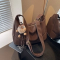Brown nylon crescent bag with adjustable wide strap and brown bear charm - Coffee