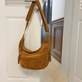 Vintage brown suede hobo bag with adjustable strap and braided zipper details - Brown