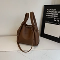 Dark brown lychee pattern leather bucket bag with top handles and a long shoulder strap - Coffee