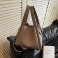 Taupe pebbled leather bucket bag with brand logo and detachable shoulder strap - Elephant Gray