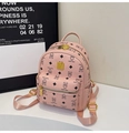 Detailed macro shot of pink backpack texture with teddy bear prints and gold hardware - No Pendant / Pink