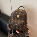Brown faux leather backpack with gold bear print and metallic logo plaque detail - With Pendant / Coffee